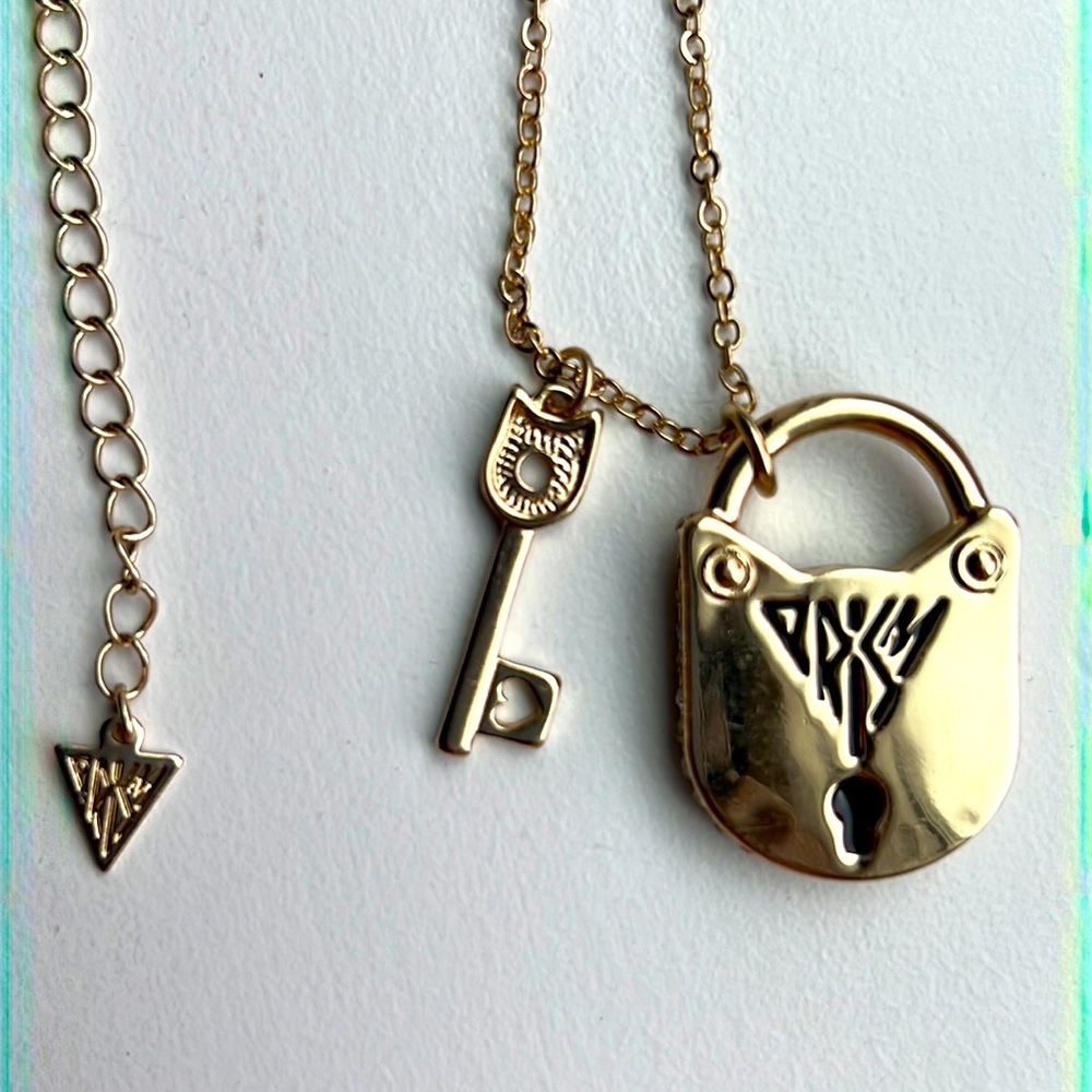 Katy Perry Necklace- gold tone. Lock, key, and cat